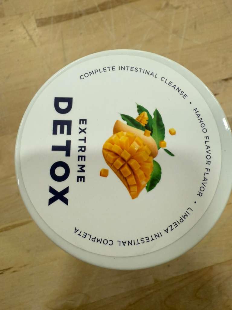 Product packaging and mango imagery for Bella Detox Powder Mango