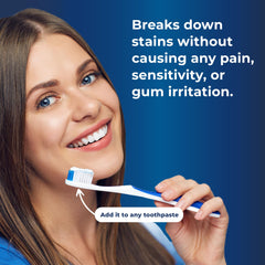 Powder scoop with BetterWhite whitening powder beside a toothbrush