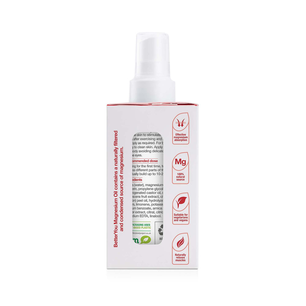 Athlete applying spray for muscle relief