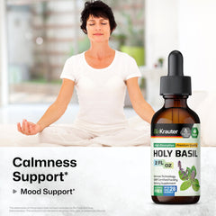 Close-up of holy basil tincture droplets in glass dropper