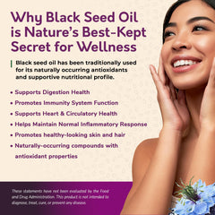 Unrefined black seed oil pouring from a glass bottle