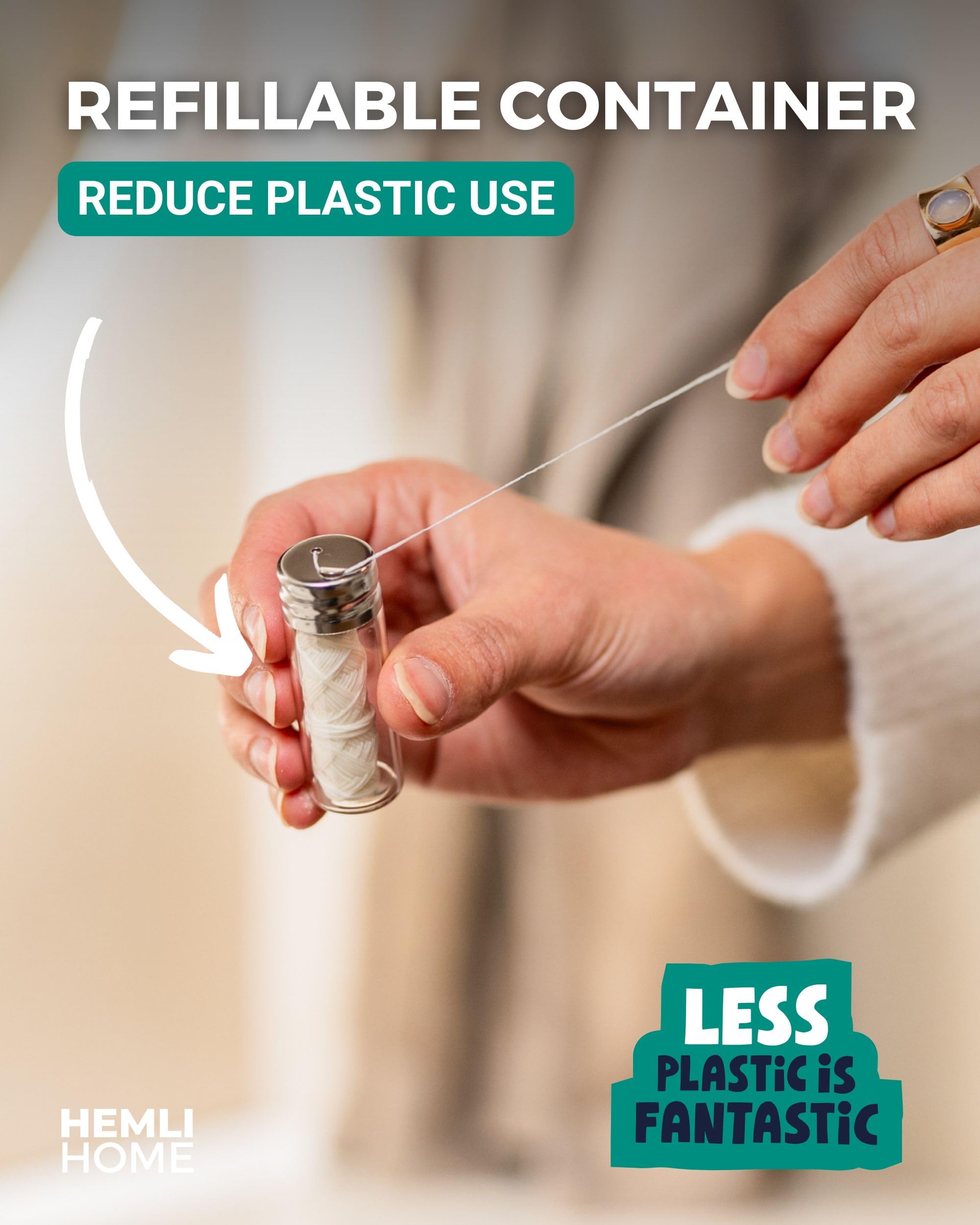 Refillable glass floss container with silk floss spools