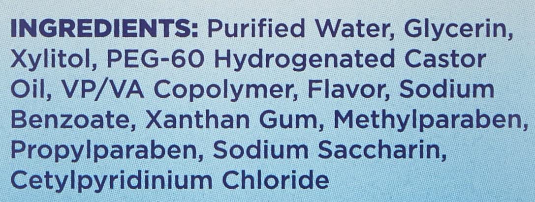 Open spray bottle demonstrating application for dry mouth relief with mint flavor