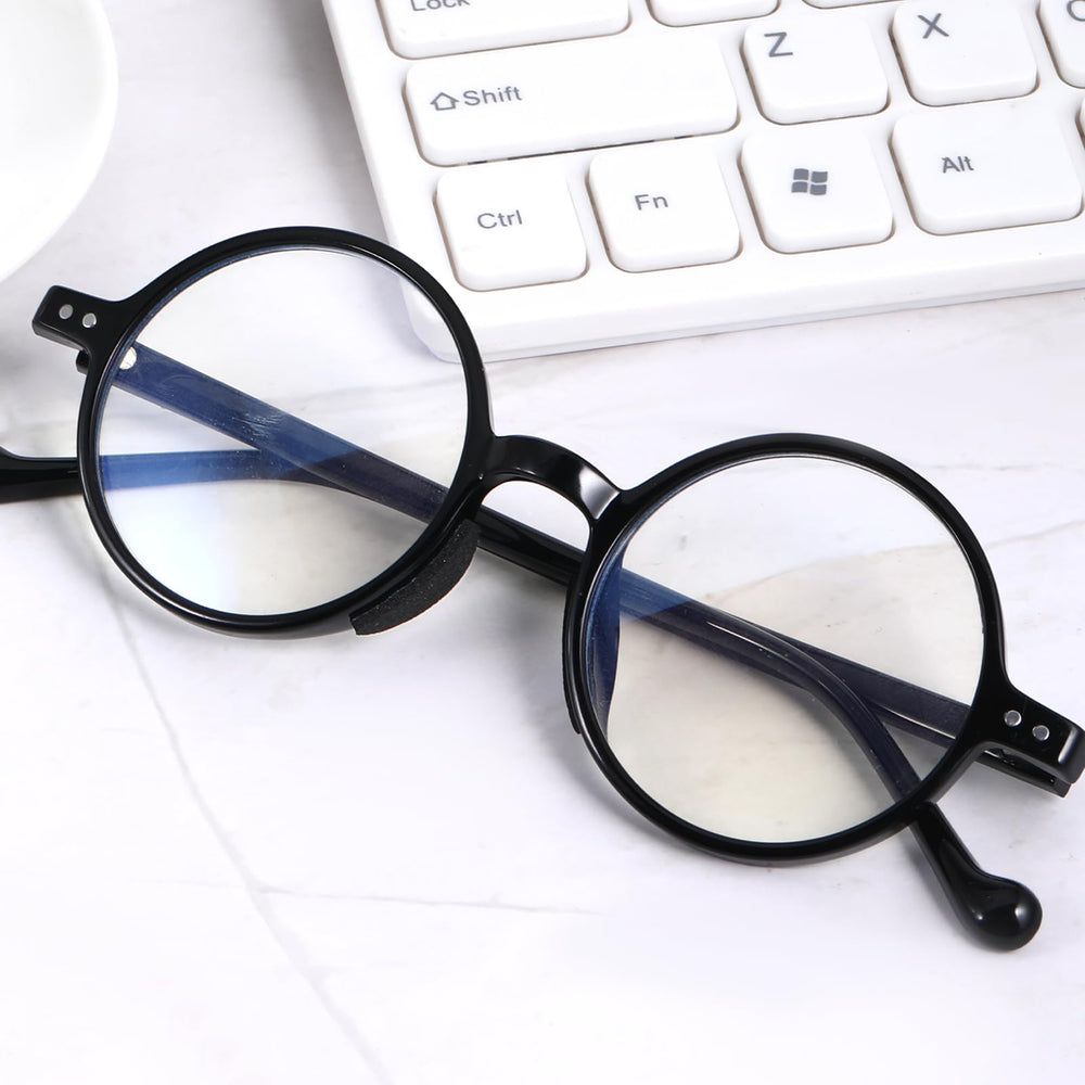 Eyeglasses with anti-slip black nose pads applied