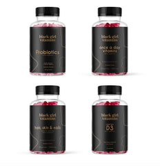 Black Girl Vitamins bundle featuring D3 gummies, probiotics, hair-skin-nails vitamins, and sea moss capsules