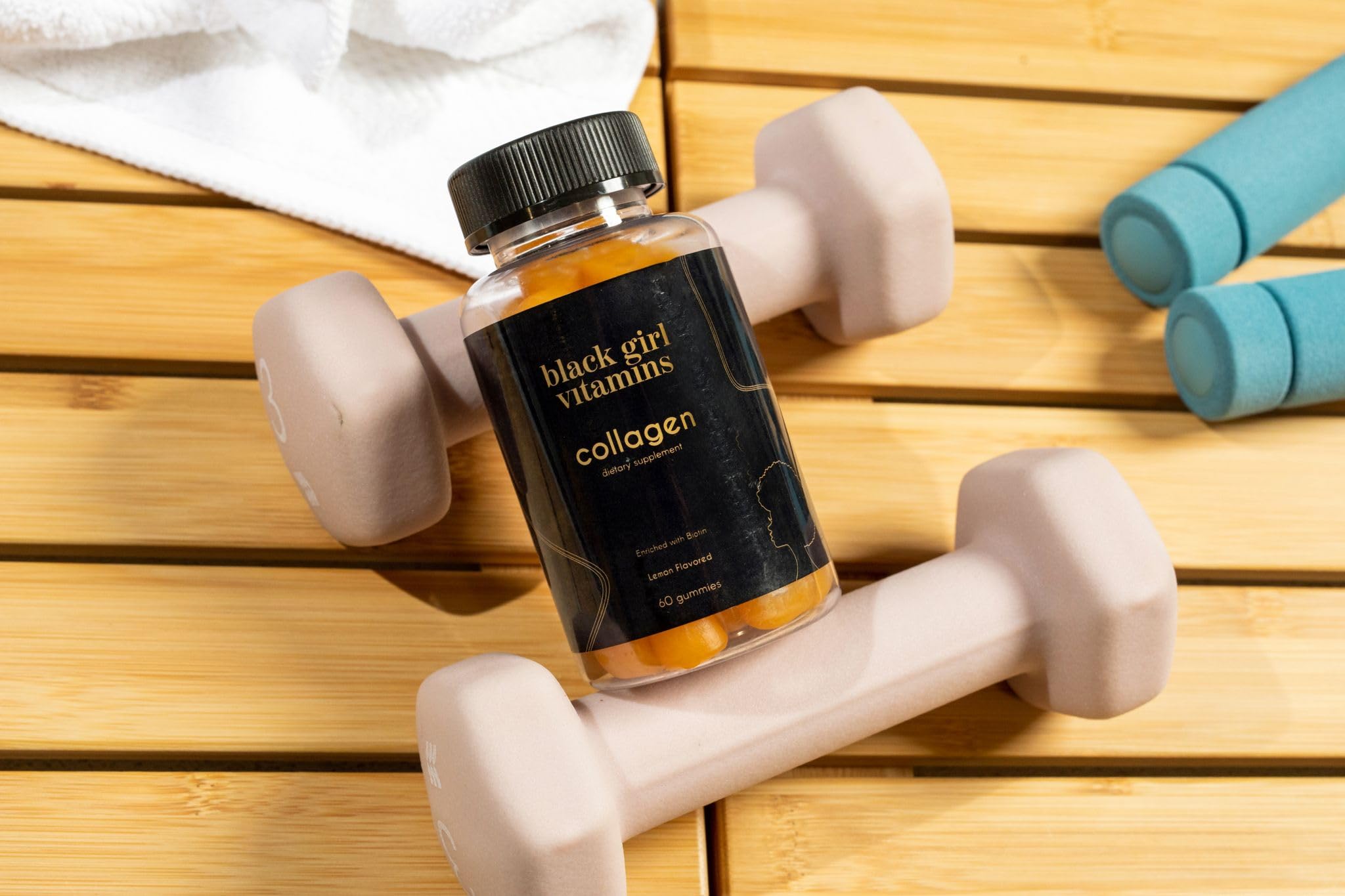 Graphic showing Vitamin C, Vitamin E, and Biotin with gummies