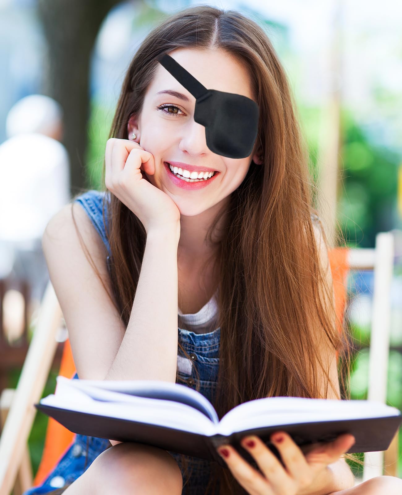 Child wearing blue right-eye eye patch
