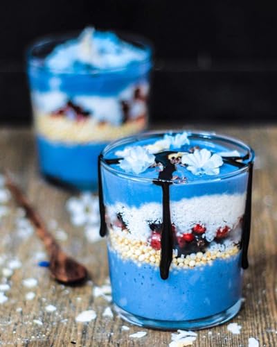 Blue spirulina powder sprinkled on a smoothie bowl