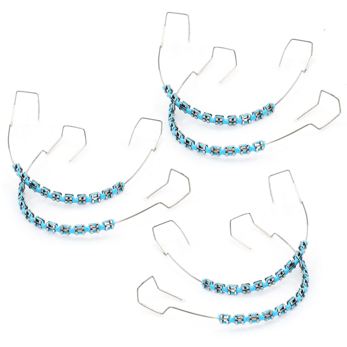 Three blue teeth retainer braces set for orthodontic teaching.