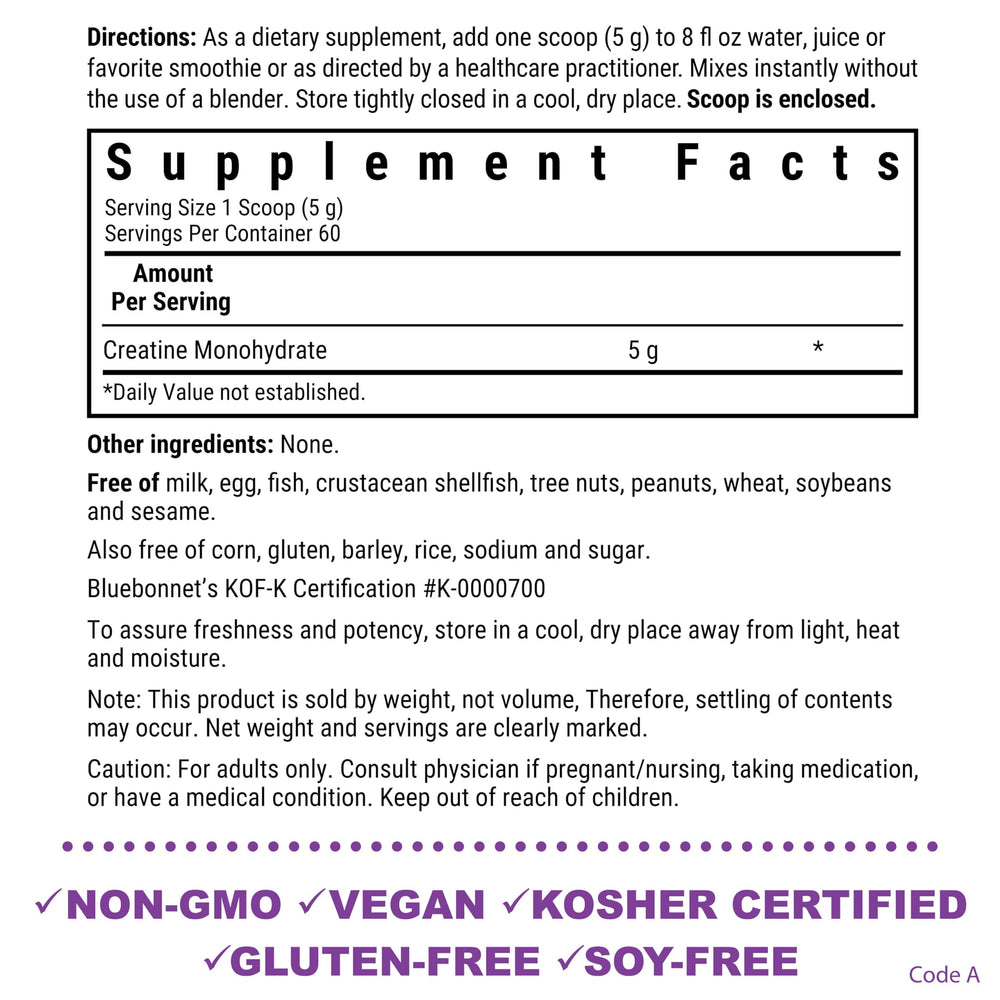 Measuring scoop with creatine monohydrate powder