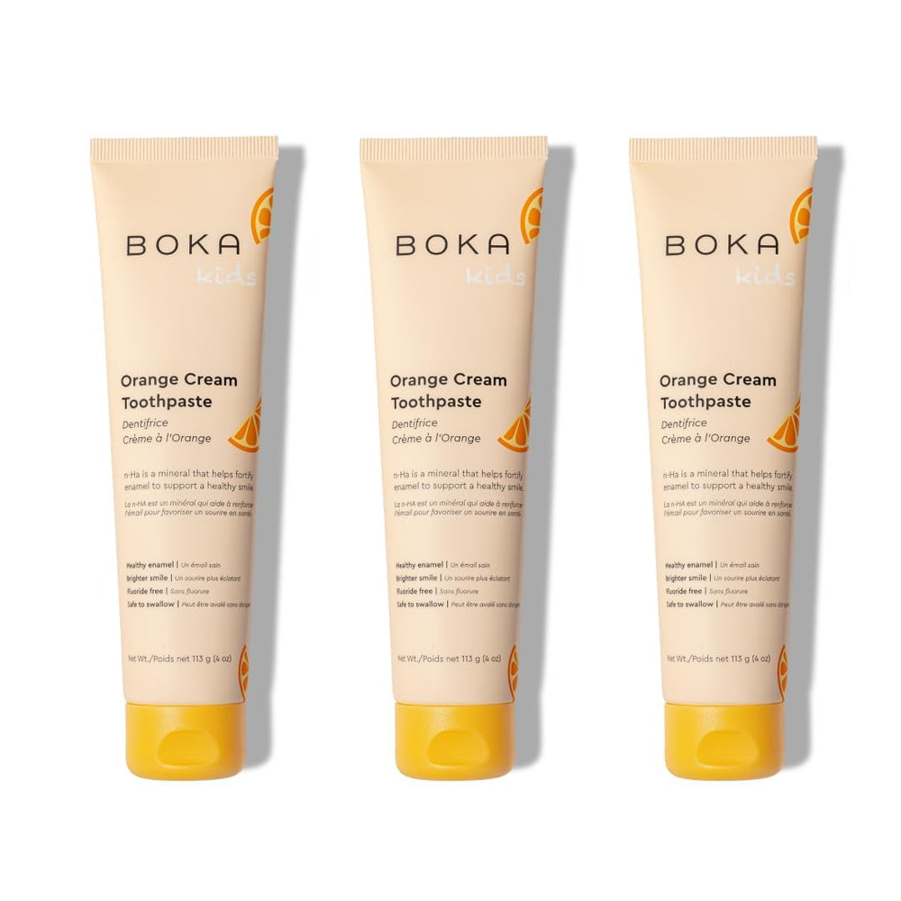 Packaging of Boka fluoride-free toothpaste orange cream 4 oz 3-pack
