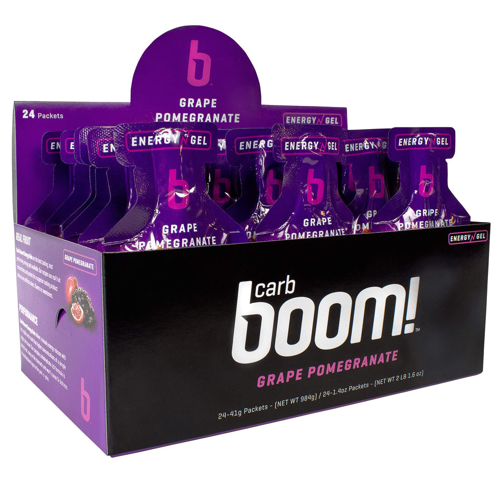 Close-up of a Carb Boom energy gel pouch in grape pomegranate flavor