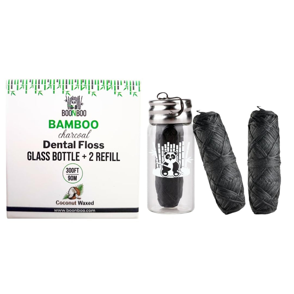 BOONBOO dental floss with bamboo charcoal woven thread in a glass bottle