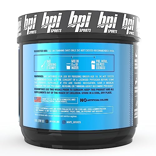 Serving scoop with creatine powder and glass of water