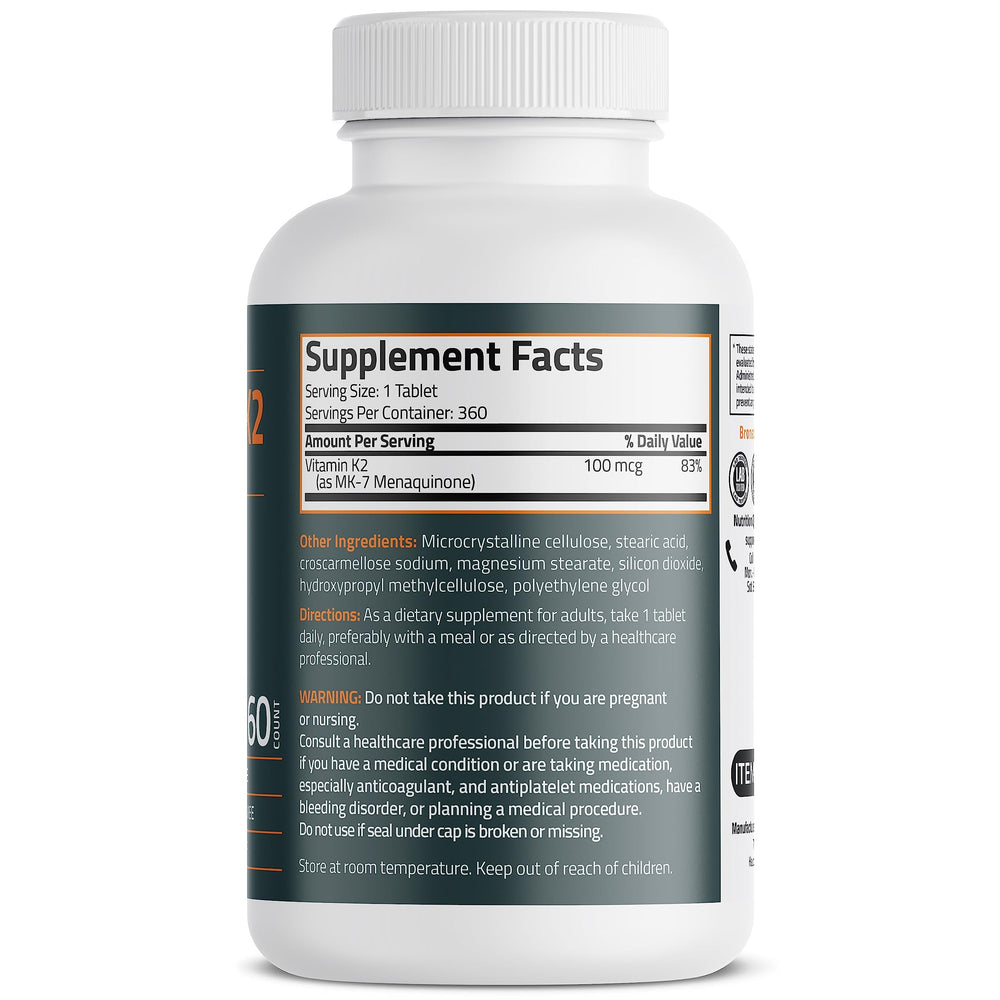 Close-up of Bronson Vitamin K2 MK-7 tablet at 100 mcg