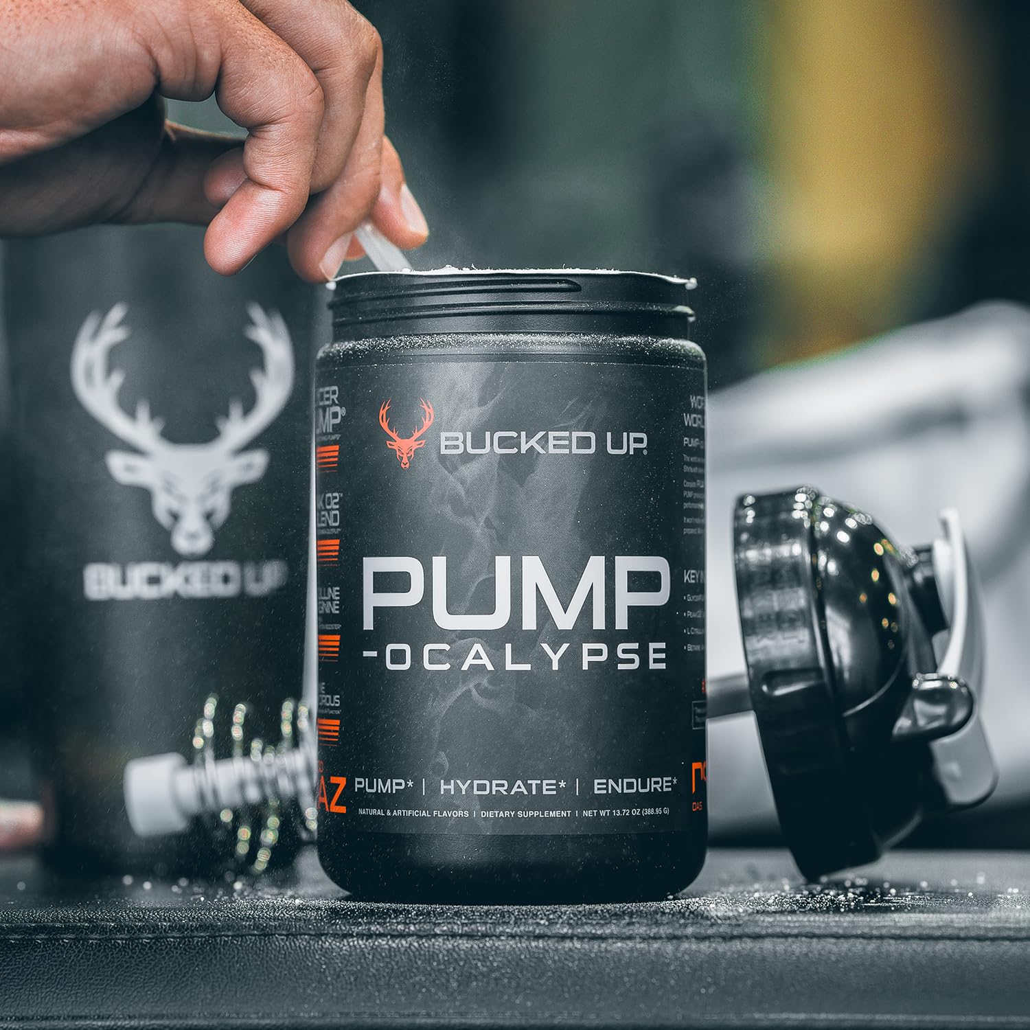 Bucked Up Pump-ocalypse powered workout setup with athletes and glowing energy.