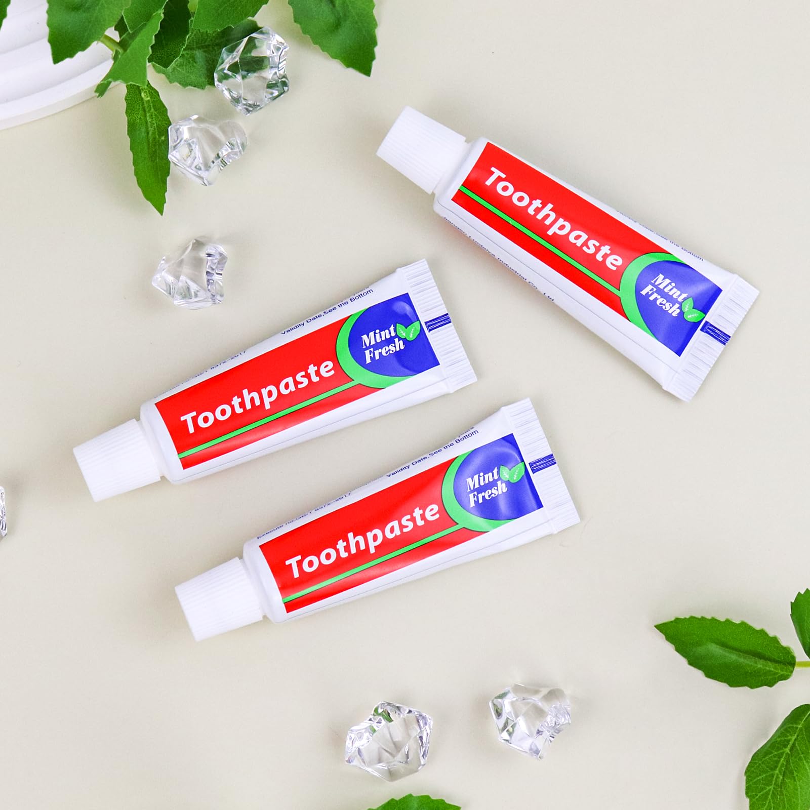 Mini toothpaste tubes included with the 30 toothbrush set