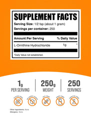 BulkSupplements l-ornithine hcl powder poured into glass for easy mixing