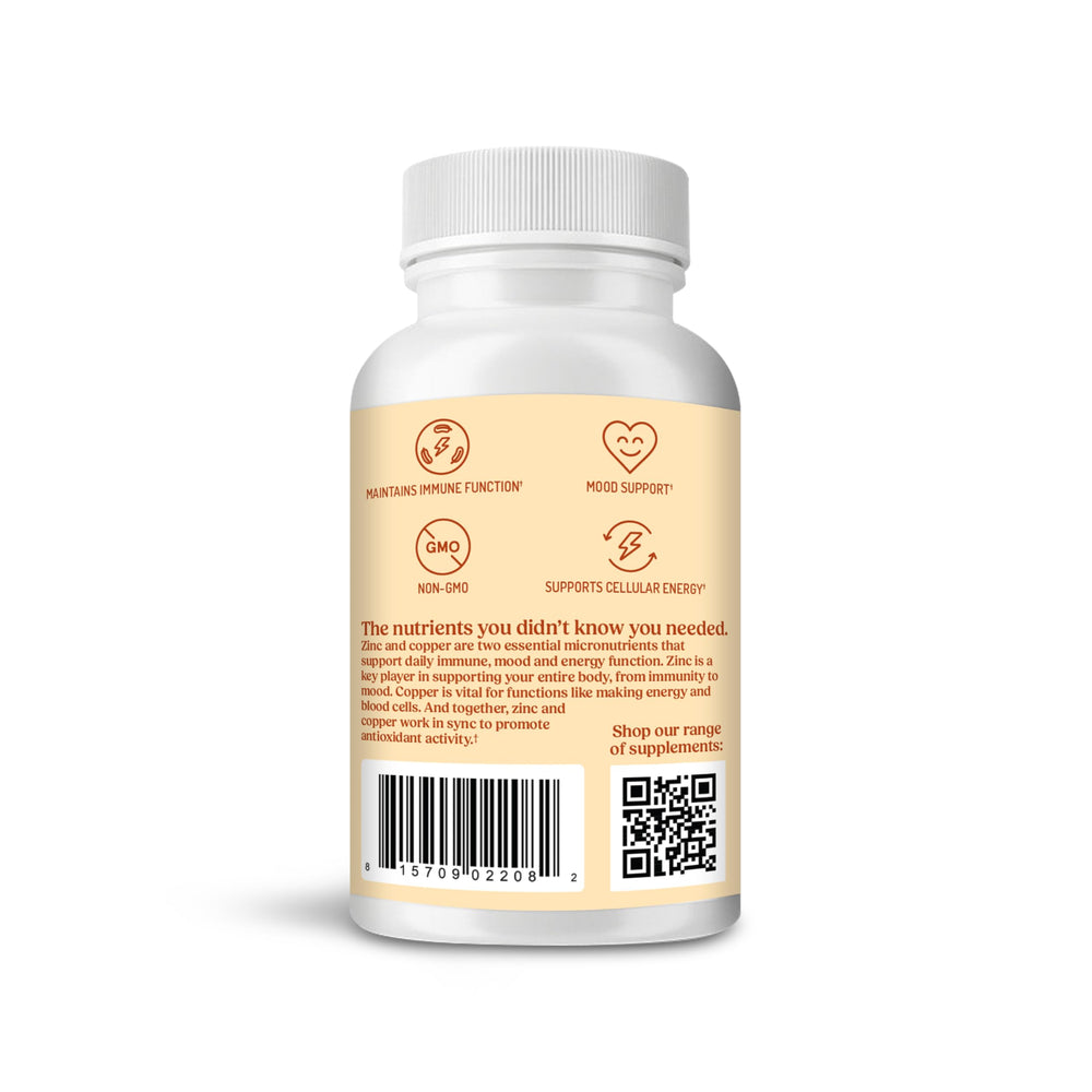 Zinc and copper supplement bottle label in focus