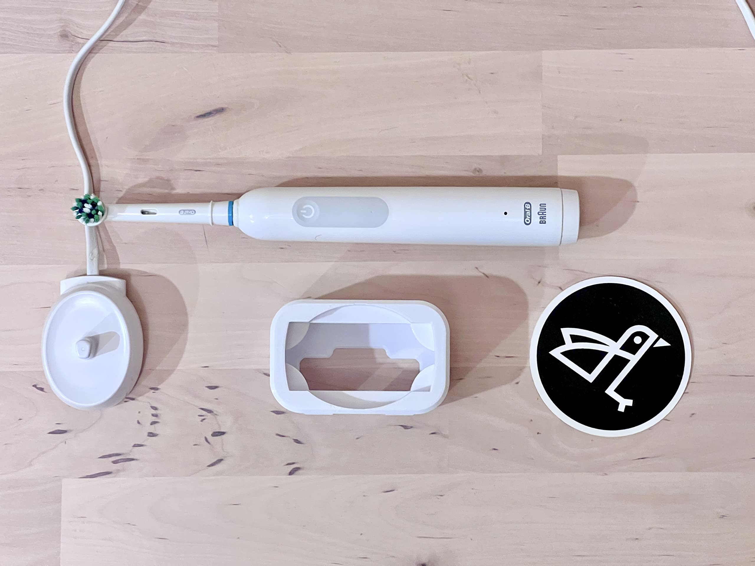 Reference image: Oral-B Pro 1000 charger shown for reference
