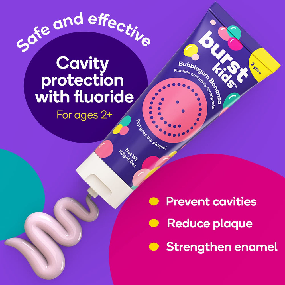 Smiling child using BURST Marshmallow Sparkle toothpaste