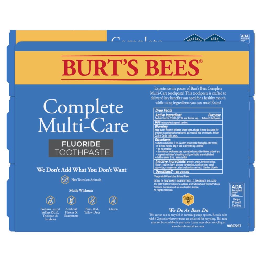 Person smiling after brushing with Burt's Bees Complete Multi-Care toothpaste