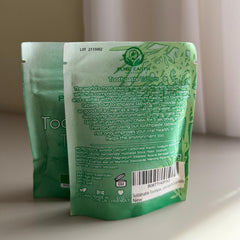 Calcium carbonate in toothpaste tablet for plaque removal