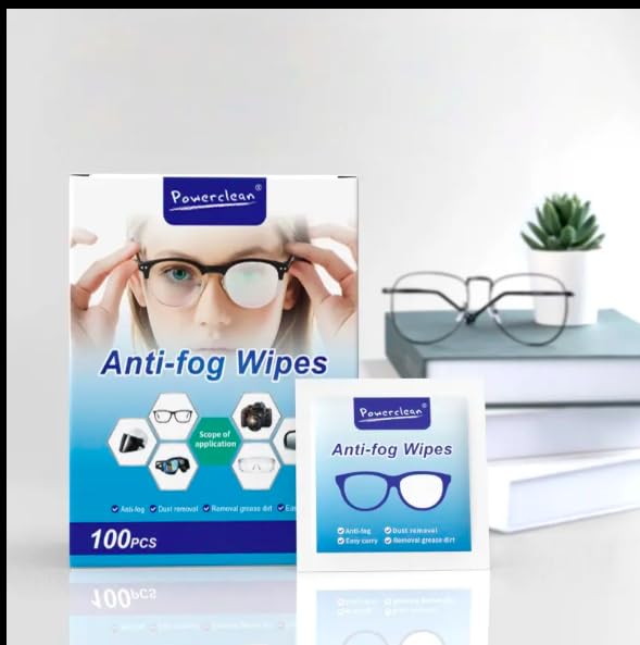 Camera lens being cleaned with anti-fog wipe