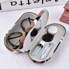 Case interior with built-in mirror and space for contact lenses