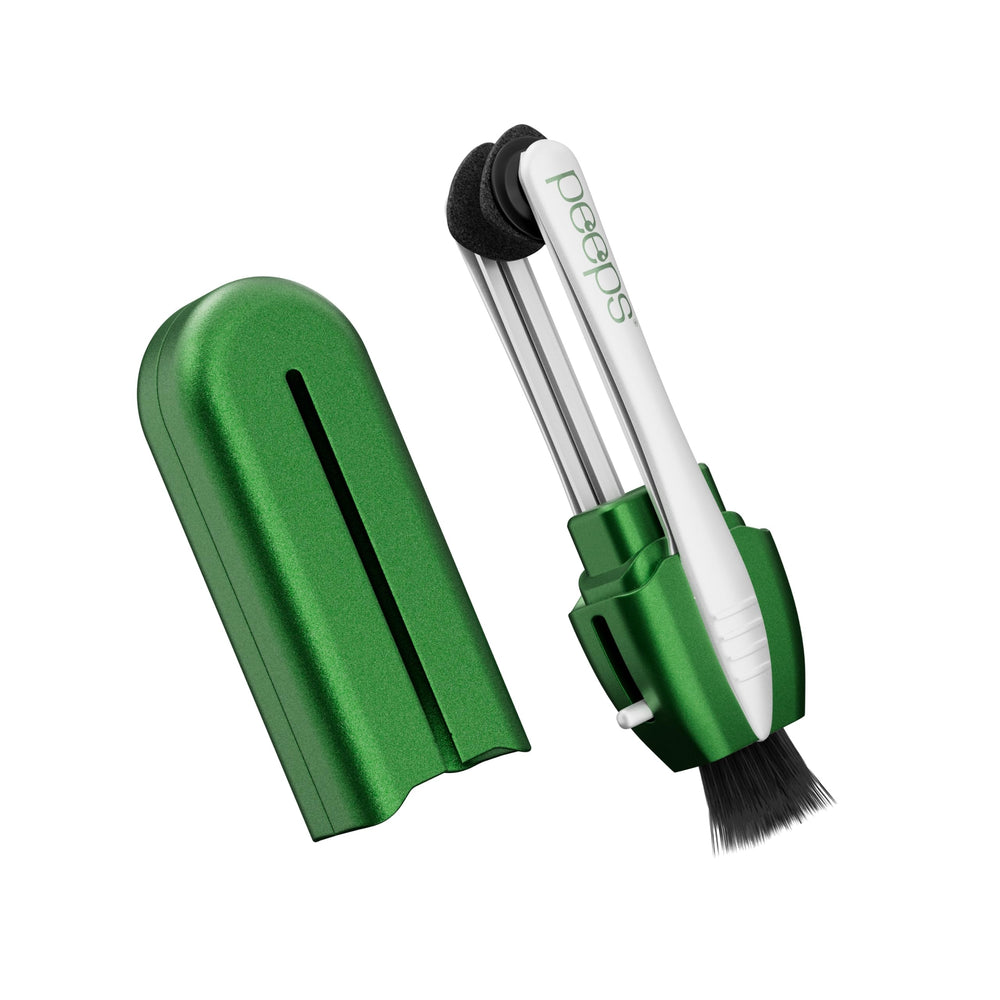 Green Soft Touch Carbon Klean Peeps eyeglass cleaner held in hand