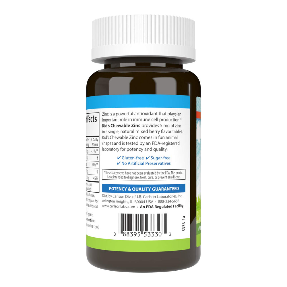 Close-up of an animal-shaped zinc chewable tablet in mixed berry flavor