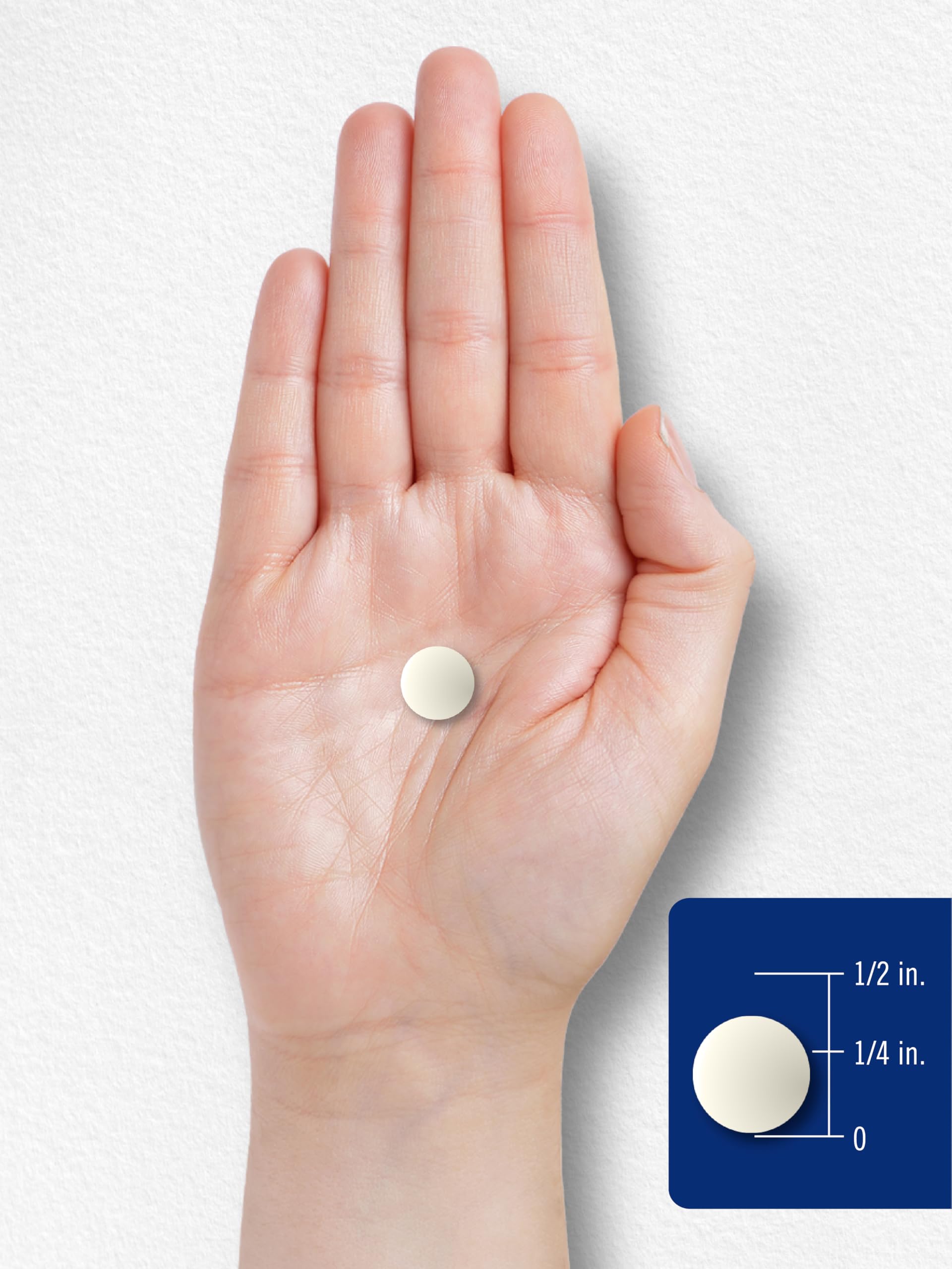 Vitamin tablets being dispensed from bottle