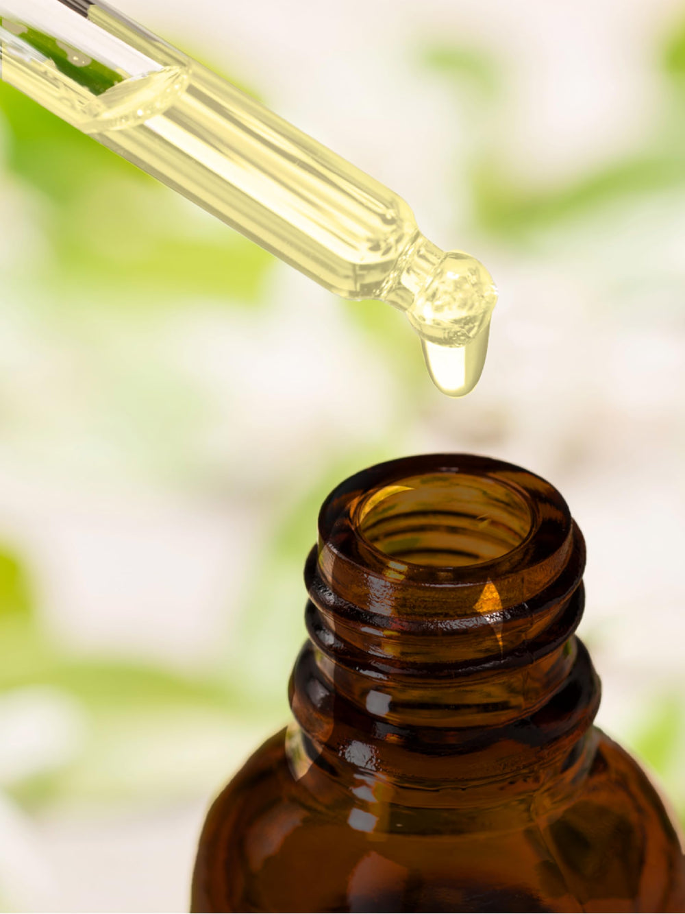 Product packaging with dropper and Carlyle branding