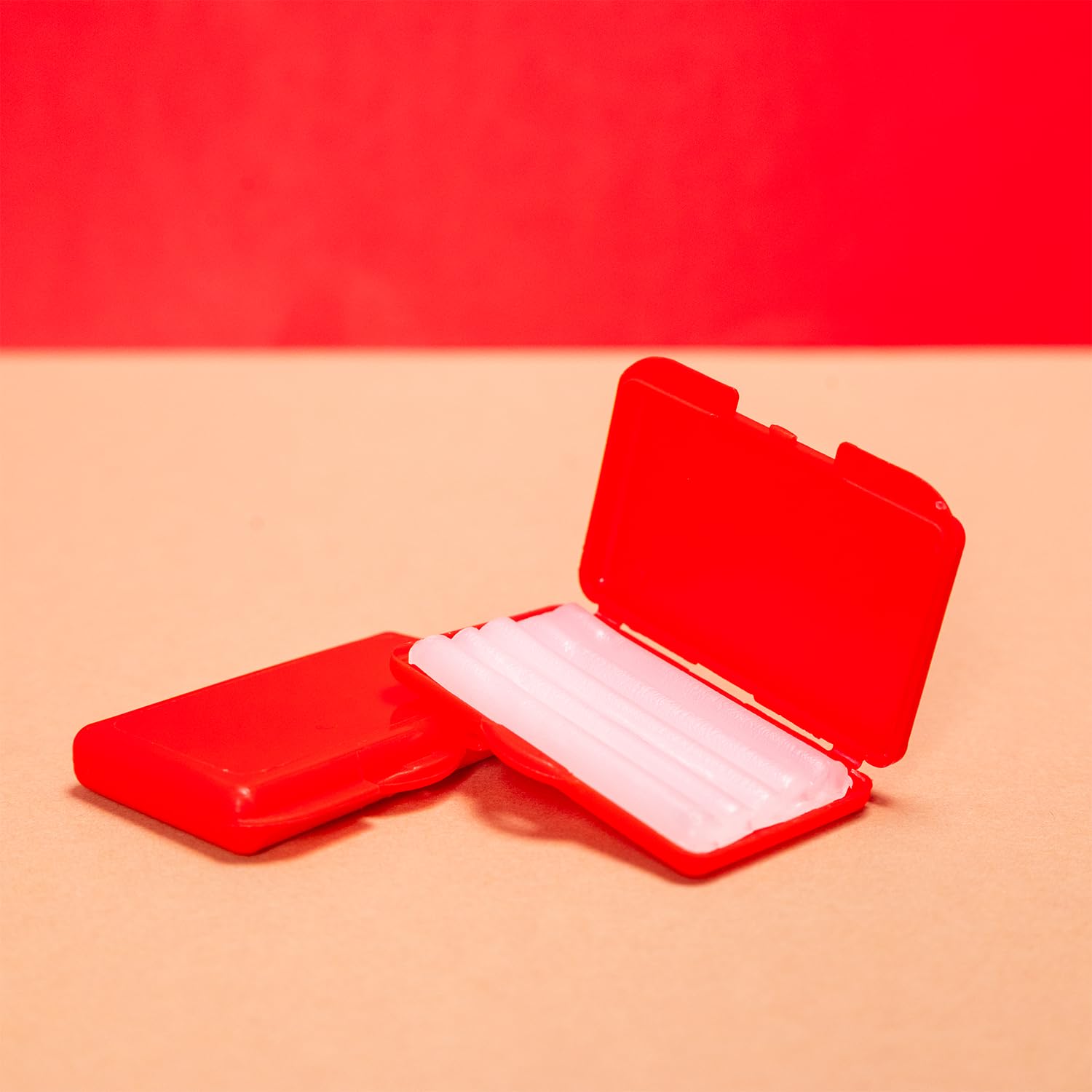 Product image illustrating Carmel Orthodontic Wax in unscented packaging