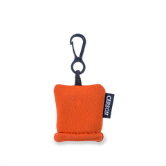 Orange Stuff-It neoprene pouch with the cloth visible
