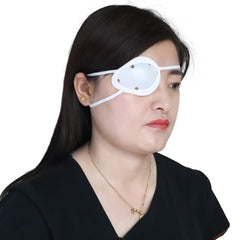White cataract surgery eye patch for eye protection during sleep