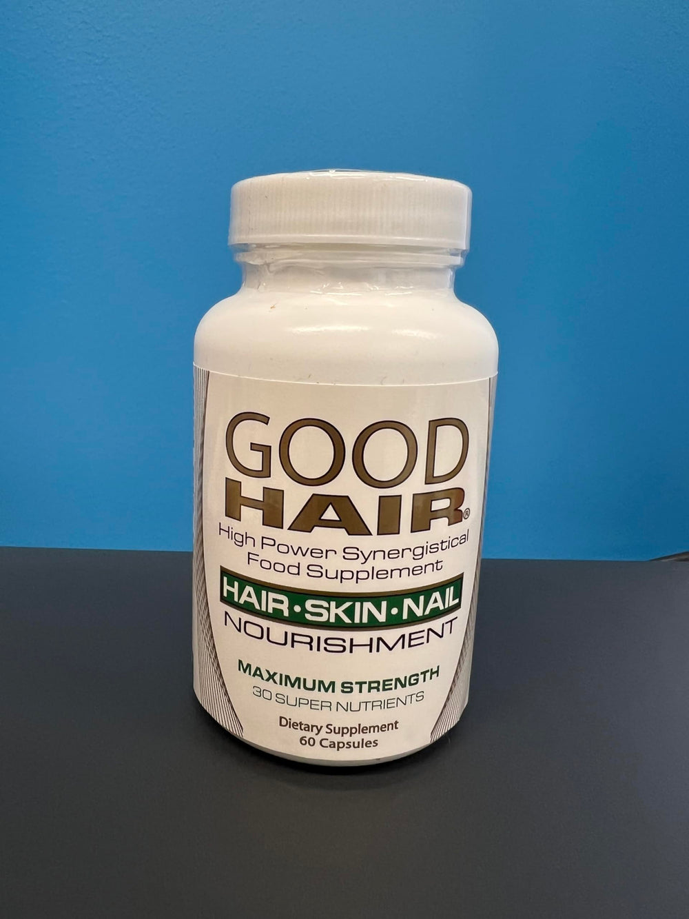 Close-up of product label showing ingredients evening primrose oil, MSM, and horsetail