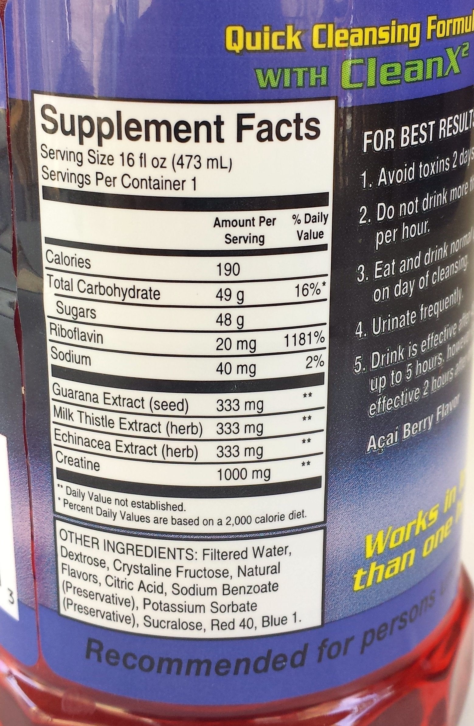 Champ Flush Out blueberry bottle on a desk suggesting portable hydration option