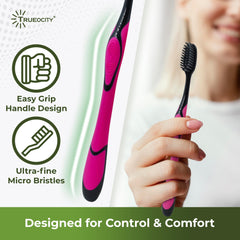 Black ergonomic handle of charcoal toothbrush