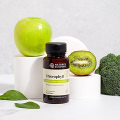 Close-up of chlorophyll capsules inside the bottle