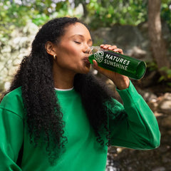 Prepared chlorophyll drink in a glass highlighting Spearmint flavor