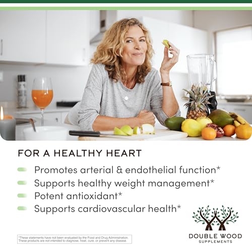 Capsules spilled from bottle against white background