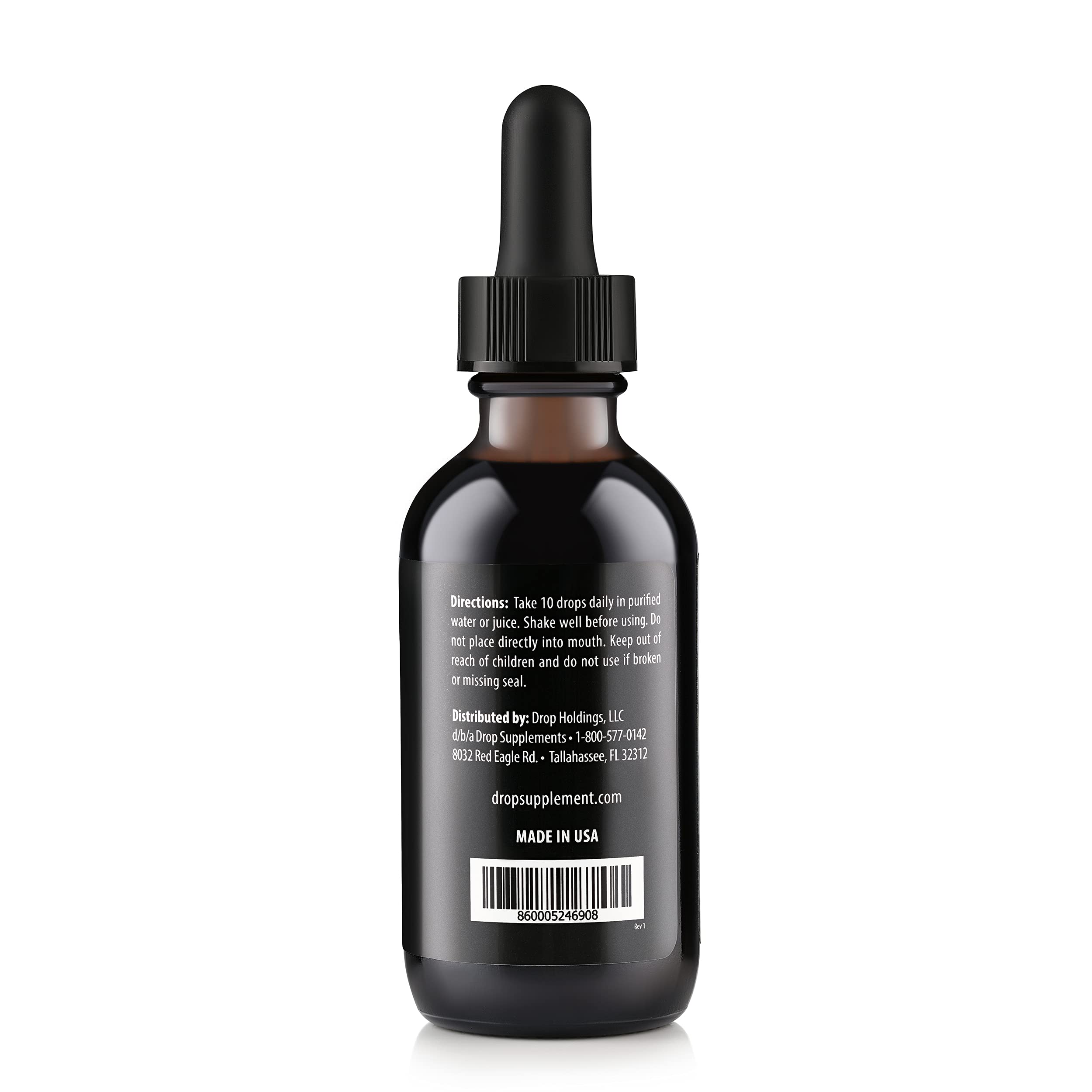 Close-up of dropper releasing fulvic minerals