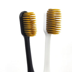 Soft toothbrush with compact head designed for sensitive teeth