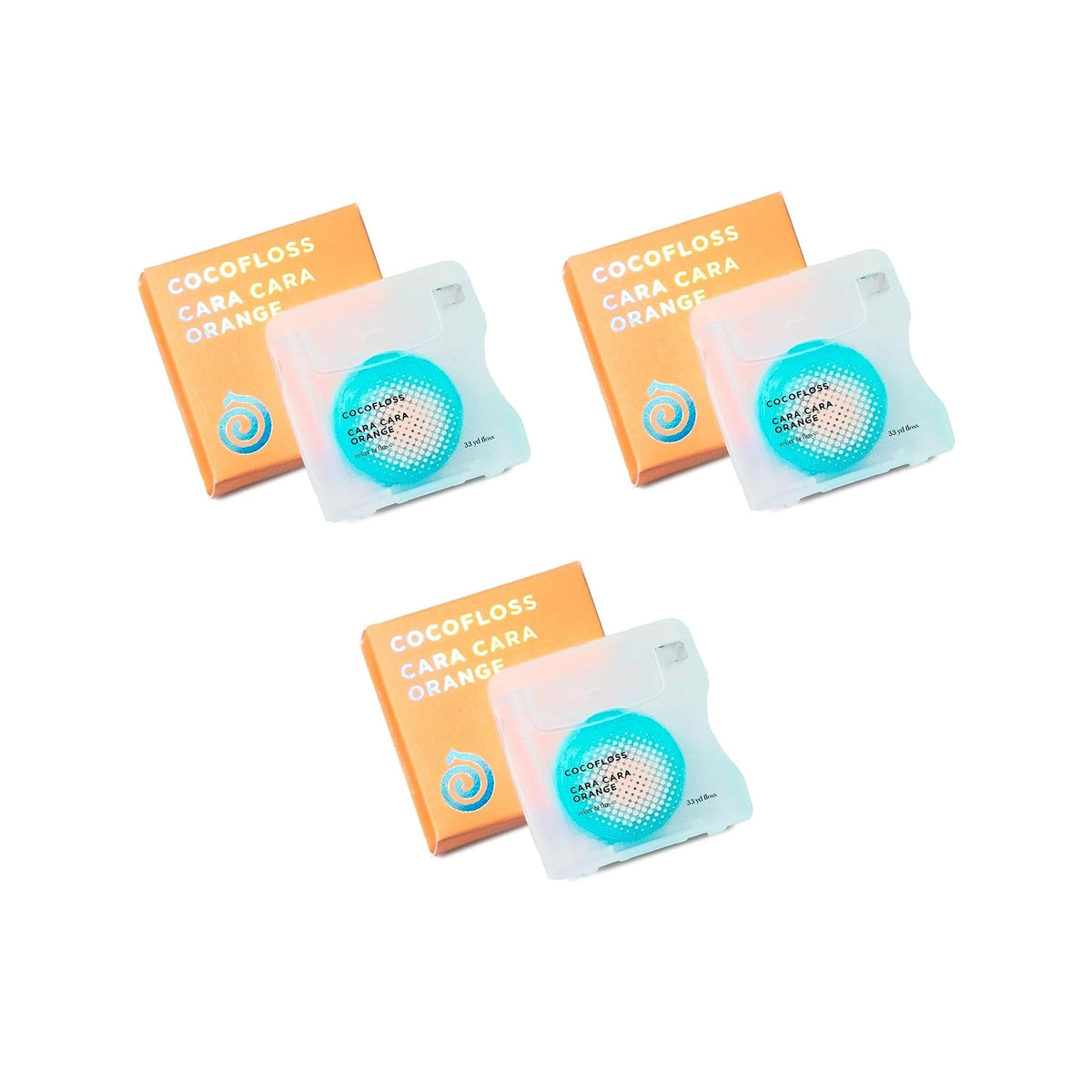 Close-up of Cocofloss woven dental floss with orange scent, waxed and expanding