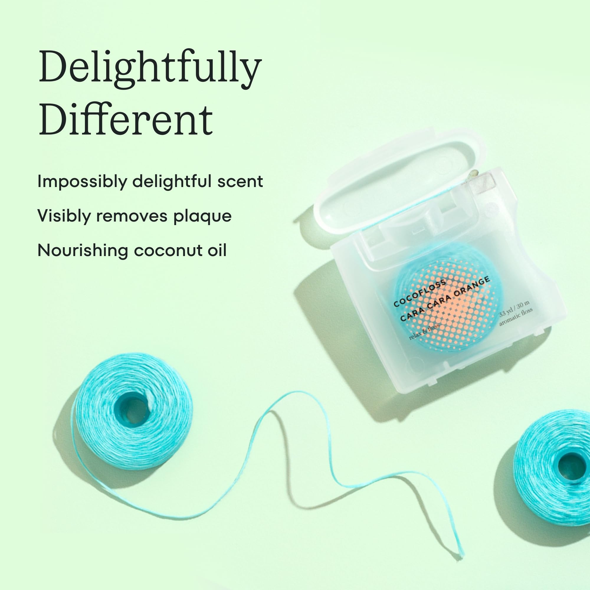 Coconut oil-infused floss with blue plaque-removal tint