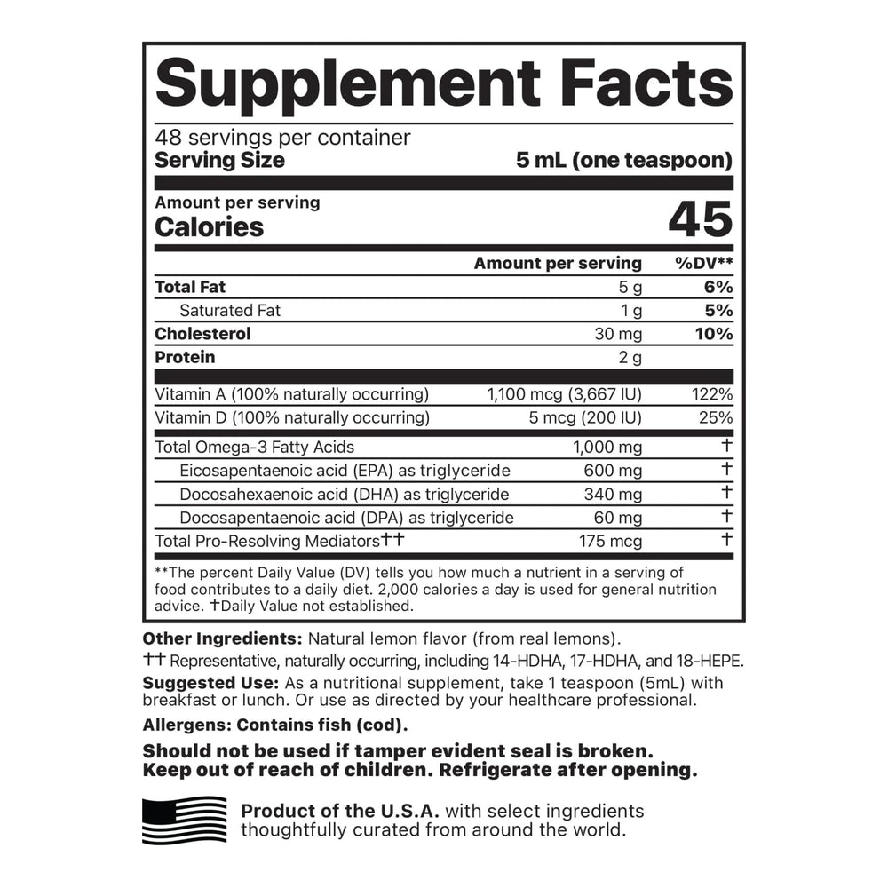 Pouring cod liver oil from a dropper into a spoon