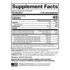 Pouring cod liver oil from a dropper into a spoon