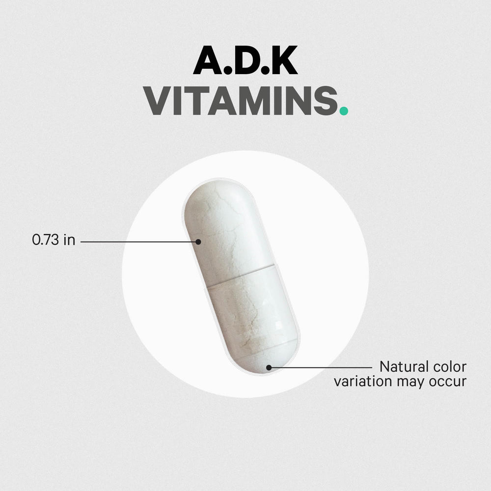 Serving scoop with ADK Vitamins capsules