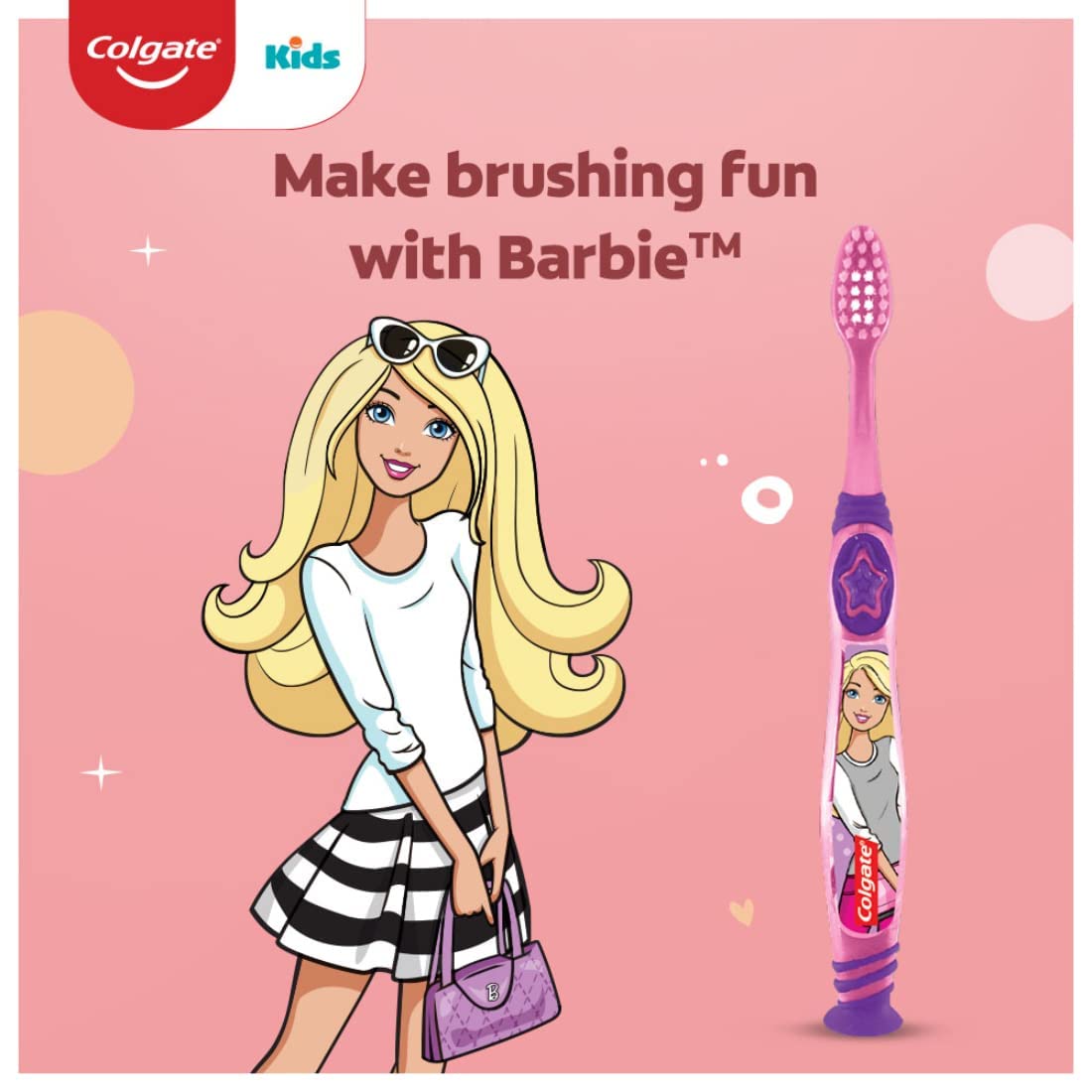 Colgate Mermaid toothbrush showing thumb grip and rounded handle